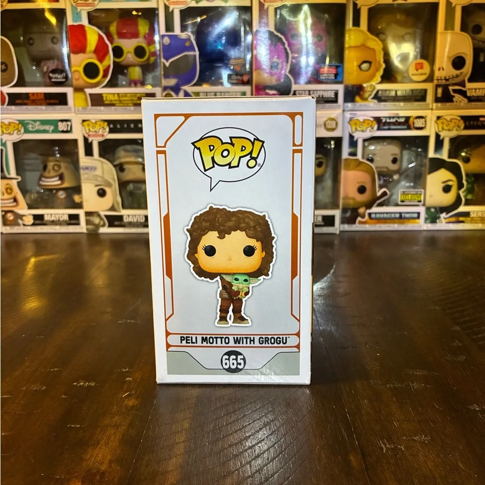 Funko Pop! Star Wars: The Mandalorian Season 3 Peli Motto with Grogu #665